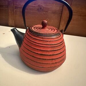 Red and Black Cast Iron Teapot